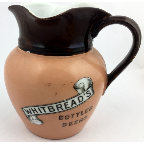 119 - WHITBREADS BOTTLED WATER JUG. 6.2ins tall. Top dark brown, flesh lower, dark brown to handle & neck.... 