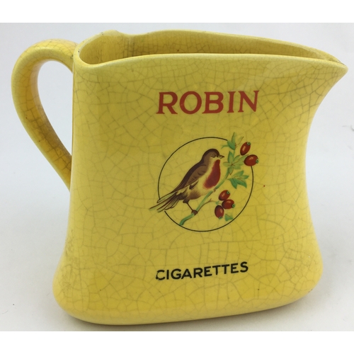 140 - ROBIN CIGARETTES JUG. 5ins tall. Yellow triangular jug . Coloured Robin pict. each side. ITC 11194 b... 