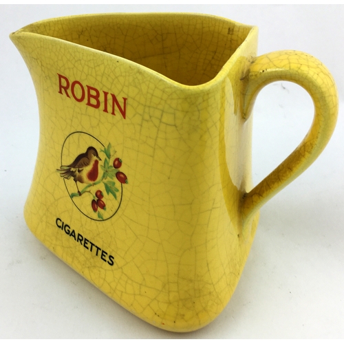 140 - ROBIN CIGARETTES JUG. 5ins tall. Yellow triangular jug . Coloured Robin pict. each side. ITC 11194 b... 