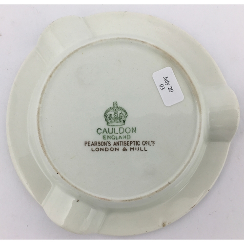 17 - PEARSONS SHEEP DIP BLOOM DIP ASHTRAY. 4.7ins diam. White glaze with coloured sheep transfer to centr... 