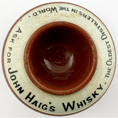 174 - JOHN HAIGS WHISKY MATCH STRIKER. 3.75ins diam., heavy tyre style, outer striking area, unusual red e... 