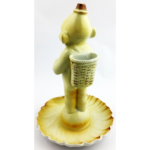 182 - CHAIRMAN TOBACCO NYMPH SHAPED VESTA HOLDER & ASHTRAY. 10.5 ins tall. Amusing yellow coloured smiling... 