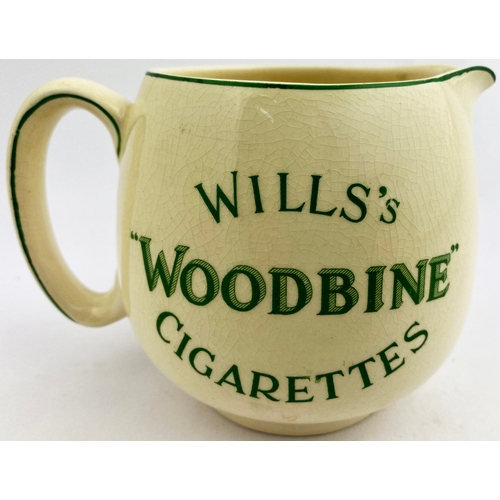 230 - WILLS WOODBINE CIGARETTES BAR TOP JUG. 4ins tall. Cream body, three green lines of letters, line on ... 