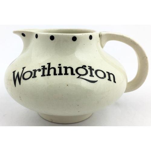 243 - WORTHINGTON BURTON ON TRENT WATER JUG. 3.4ins tall. Squat whit body shape with familiar beer facsimi... 