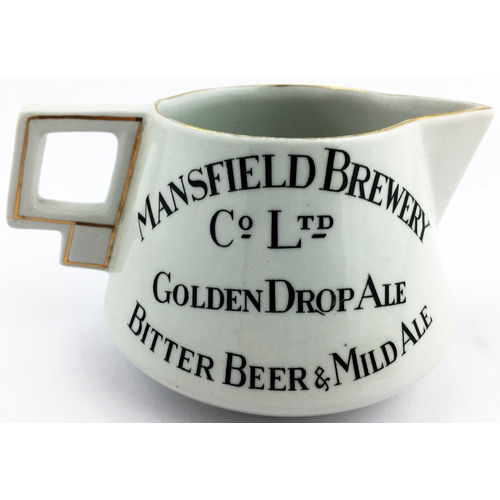 246 - ANSFIELD ALES PUB JUG . 3.5ins tall white glaze, black & red transfer âMANSFIELD ALES âWORTH HUN... 