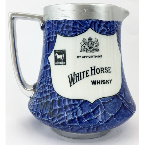 275 - WHITE HORSE WHISKY WATER JUG. 5ins tall. Blue & black crocodile effect main body finish with black o... 