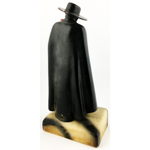 276 - SANDEMAN DON BACK BAR STATUETTE. 15.5ins tall. Painted cloaked plaster of Paris figure atop a rocky ... 