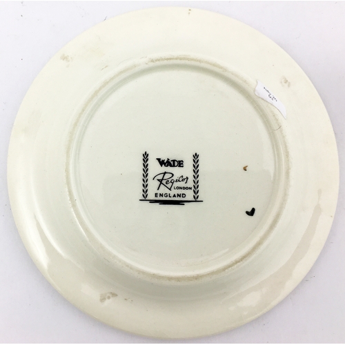 292 - ASS ASHTRAY. 5.2ins diam.Strong bright red transfer to rim with central pict. t.m. Wade Regicor base... 