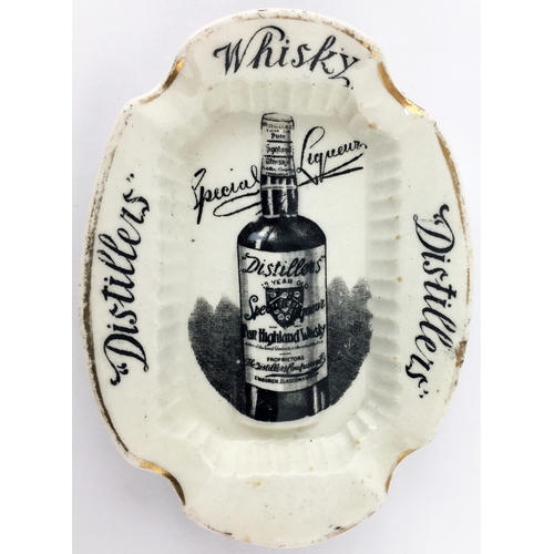 309 - DISTILLERS WHISKY SPECIAL LIQUEURS OVAL ASHTRAY. 4.2ins diam to centre. Raised highly detailed label... 