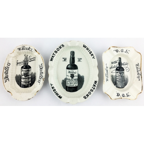 309 - DISTILLERS WHISKY SPECIAL LIQUEURS OVAL ASHTRAY. 4.2ins diam to centre. Raised highly detailed label... 