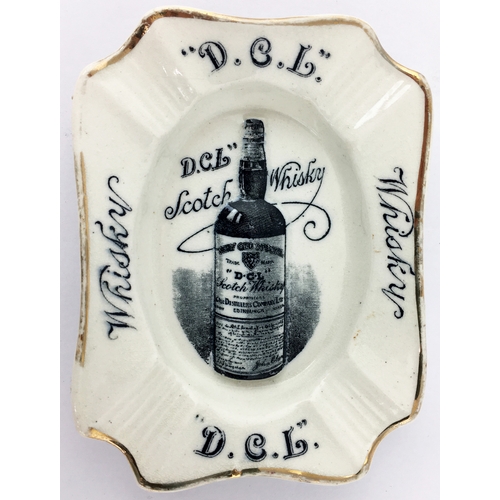 310 - WATSONS D.C.L. SCOTCH WHISKY ASHTRAY. 4.1 by 3.1ins  Raised 3D full & labelled bottle to centre. Gol... 