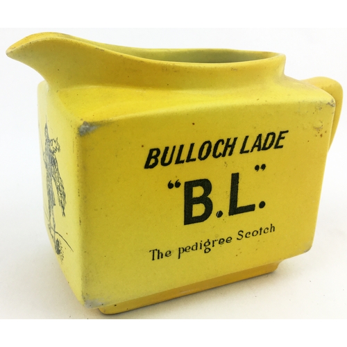 48 - BULLOCH LADE THE PEDIGREE SCOTCH WHISKY WATER JUG. 2.5 x 3.8ins rectangular base. Bright yellow body... 