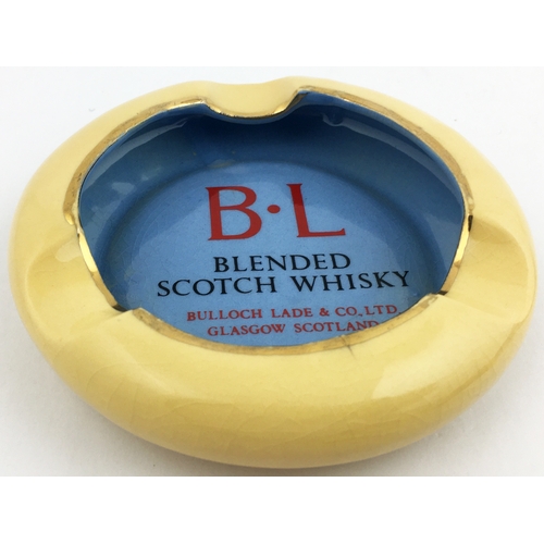 53 - BULLOCH LADE BLENDED SCOTCH WHISKY ASHTRAY. Mid blue centre with red & black lettering. Gold rim edg... 