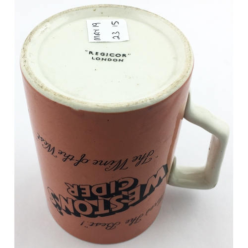 97 - WESTONâS CIDER JUG. 5.25ins tall. Black transfer on dark peach body, handled. HEREâS THE BEST/ T... 