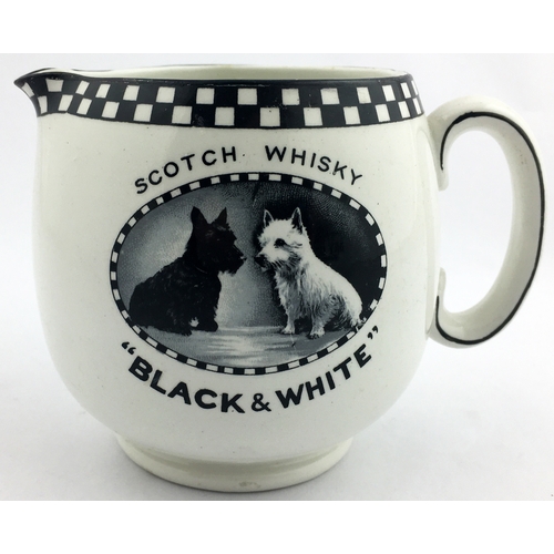 98 - BLACK & WHITE WHISKY JUG. 4ins tall. Black & White dogs pict to centre both sides, lettering around.... 