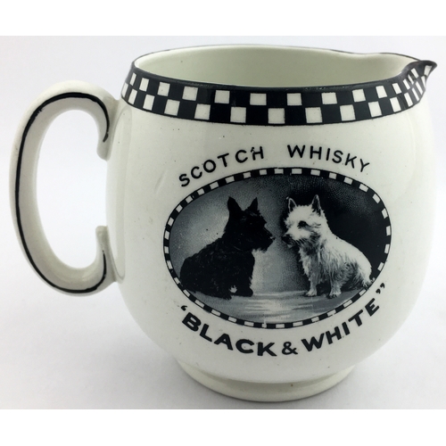 98 - BLACK & WHITE WHISKY JUG. 4ins tall. Black & White dogs pict to centre both sides, lettering around.... 