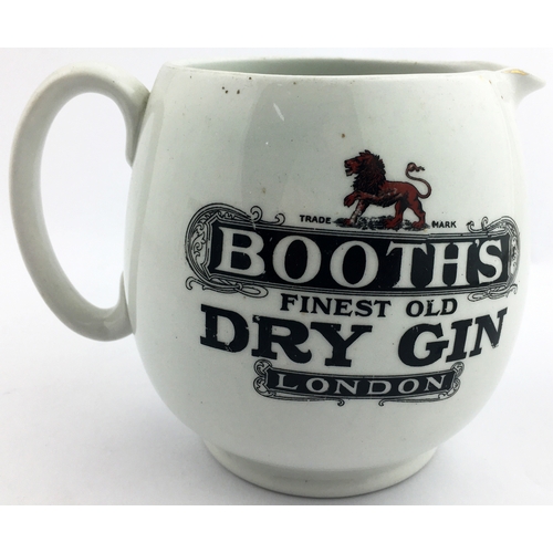 99 - BOOTHS DRY GIN JUG. 5ins tall. Transfer printed both sides, in red and black with lion pictorial at ... 