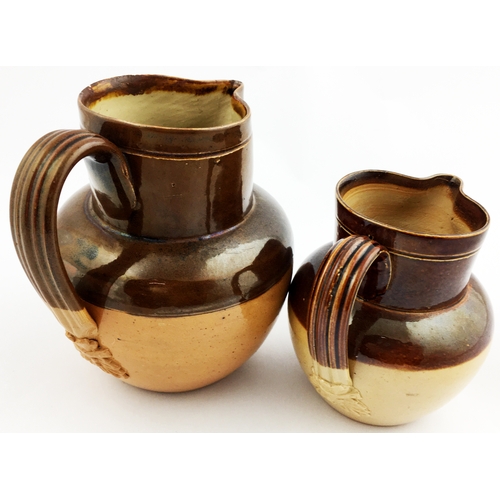 197 - HAIGS WHISKY WATER JUG DUO.  Tallest 5.5ins. Each dark brown top, lower mid brown salt glaze. Slight... 