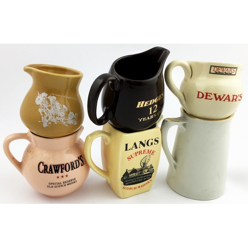 201 - MINIATURE WHISKY JUG GROUP.  Tallest 4.2ins tall. Various colours, six different brand names: 2 Dewa... 