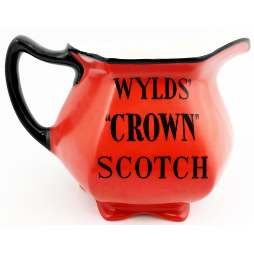 54 - GEORGES BEERS / WYLDS CROWN SCOTCH WHISKY WATER JUG. 4.5ins tall. Bright red body with black letteri... 