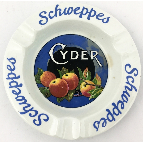 59 - SCHWEPPES CYDER ASHTRAY. 5 ins diam. Multicoloured central image of apples and blue lettering around... 