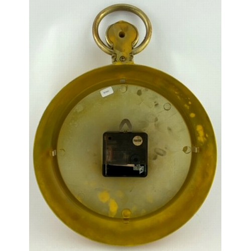 150 - BENSON AND HEDGES POCKET WATCH. SHAPED CLOCK. 9.5ins diam. Ornamental winder & ring to top, some col... 