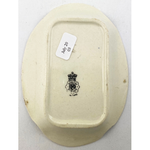 309 - DISTILLERS WHISKY SPECIAL LIQUEURS OVAL ASHTRAY. 4.2ins diam to centre. Raised highly detailed label... 