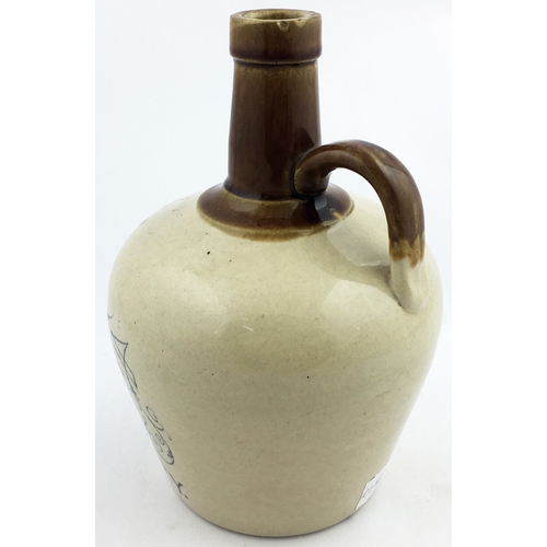 116 - HAPPY DAYS WHISKY JUG. (WG B253) 8ins tall, t.t., rear handle. Brown neck, lower off white. Detailed... 