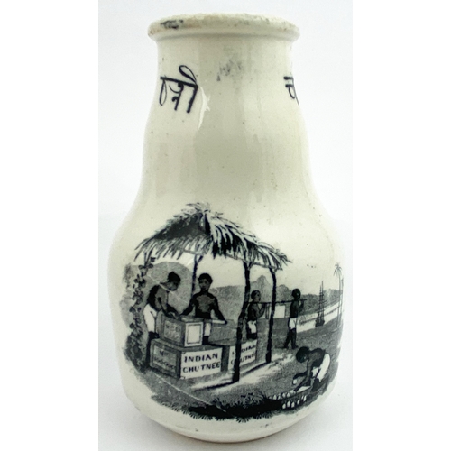 131 - INDIAN CHUTNEY JAR. 4.75ins tall. Black & white with 2 differnt pics either side. Several hairlines ... 