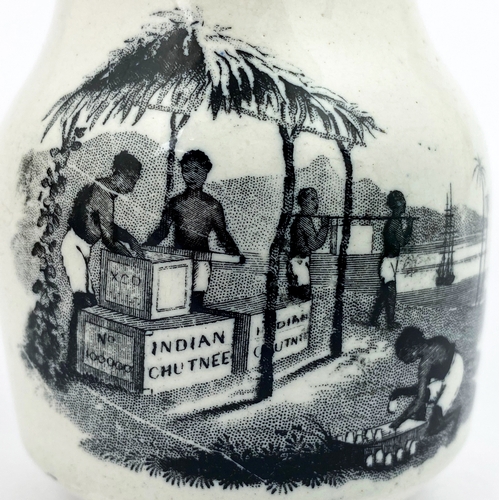 131 - INDIAN CHUTNEY JAR. 4.75ins tall. Black & white with 2 differnt pics either side. Several hairlines ... 