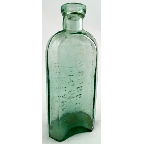 29 - RIGGE EMBOSSED EARLY MEDICINE BOTTLE. 6ins tall, aqua glass, tooled band lip, arched shoulders with ... 