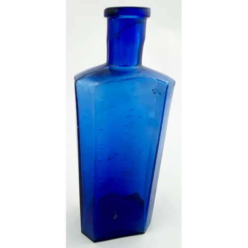 30 - G. HANDYSIDE SYRUP BOTTLE. 6.5ins tall. Bright blue glass, rectangular body, chamfered corners. Fron... 