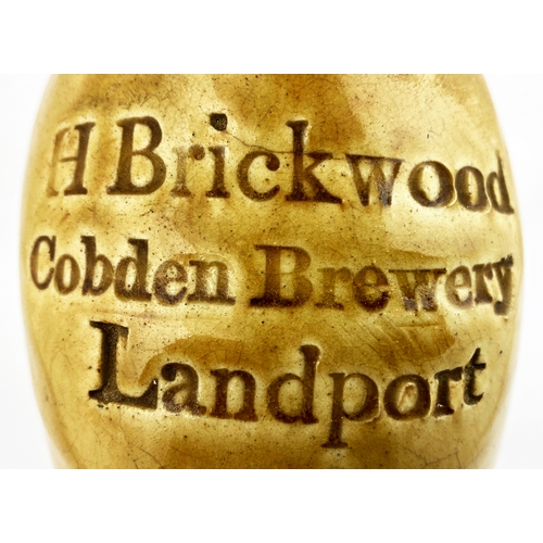 319 - LANDPORT FLAGON. 12ins tall, t.t. Bristol type glaze. Shoulder impressed H BRICKWOOD/ COBDEN BREWERY... 