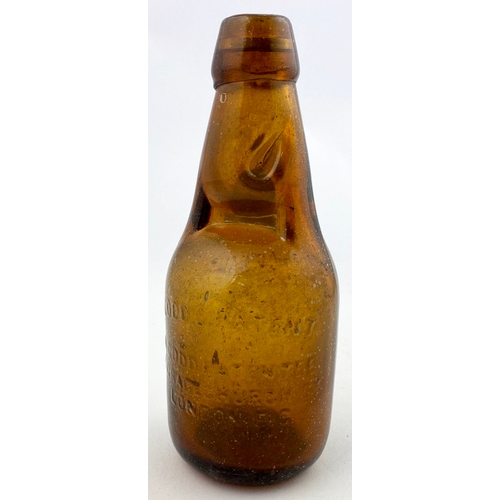 326 - DUMPY CODDS PATENT BOTTLE. 7.5ins tall. Mid brown glass, 2 neck retaining lugs. Embossed CODDS PATEN... 