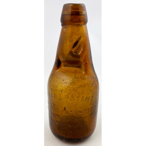 326 - DUMPY CODDS PATENT BOTTLE. 7.5ins tall. Mid brown glass, 2 neck retaining lugs. Embossed CODDS PATEN... 