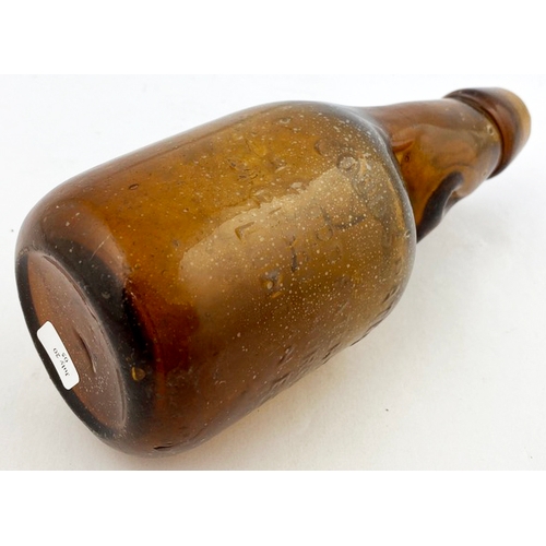 326 - DUMPY CODDS PATENT BOTTLE. 7.5ins tall. Mid brown glass, 2 neck retaining lugs. Embossed CODDS PATEN... 