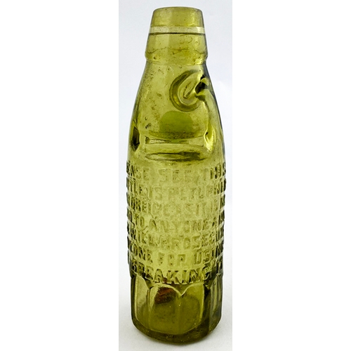 328 - AMBER KEYSTONE CODD BOTTLE. 7.25ins tall. Pale yellow amber glass, distinctive ten sided lower secti... 