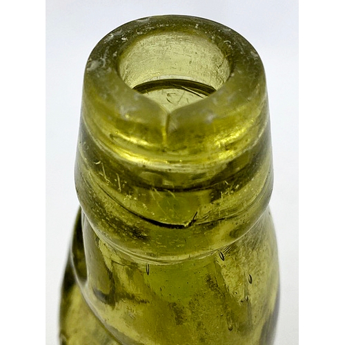 328 - AMBER KEYSTONE CODD BOTTLE. 7.25ins tall. Pale yellow amber glass, distinctive ten sided lower secti... 