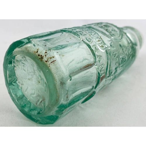 329 - KEYSTONE CODD BOTTLE. 7.5ins tall. Aqua glass, 10 sided base, 2 neck retaining lugs. Heavily embosse... 