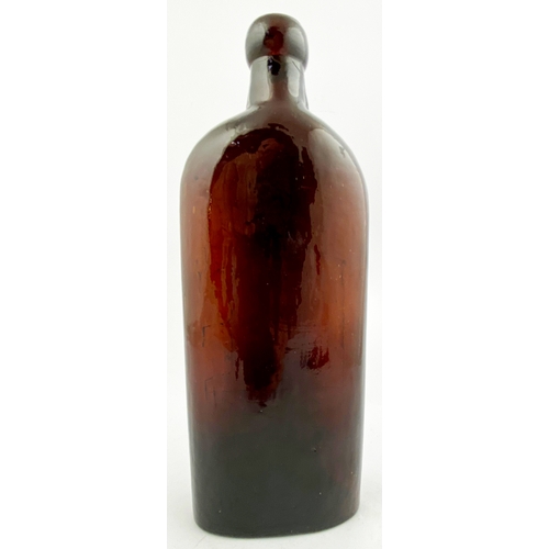 39 - WARNERS SAFE CURE MELBOURNE BOTTLE. 9.5ins tall. One pint, dark red amber glass, sloping shoulders, ... 