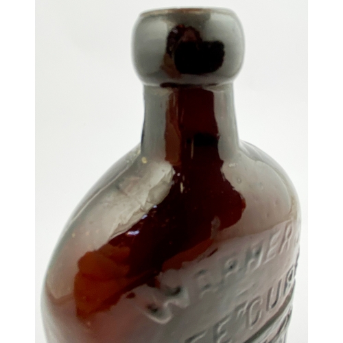 39 - WARNERS SAFE CURE MELBOURNE BOTTLE. 9.5ins tall. One pint, dark red amber glass, sloping shoulders, ... 