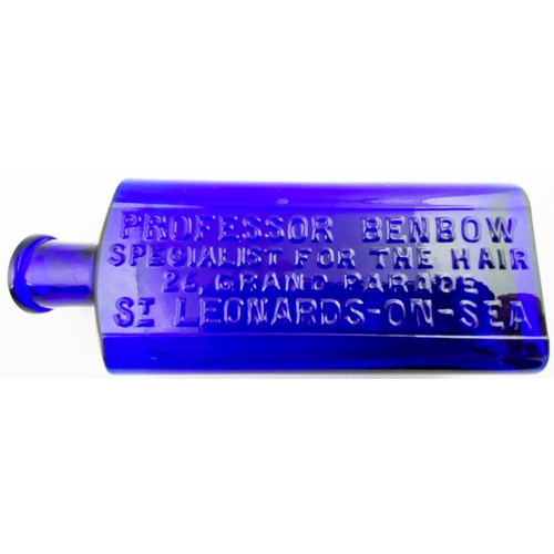 46 - ST LEONARDS- ON- SEA HAIR RESTORER BOTTLE. 6ins tall. Cobalt blue glass. Rectangular shape, rounded ... 