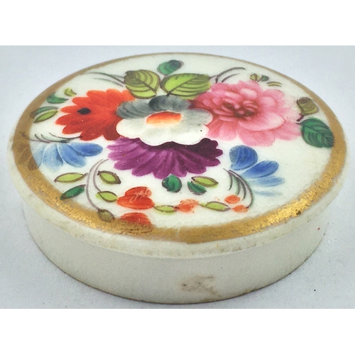 48 - FLOWERS POT LID. 1.5ins diam. Multicoloured with very bright hand painted (?) flowers, gold band to ... 