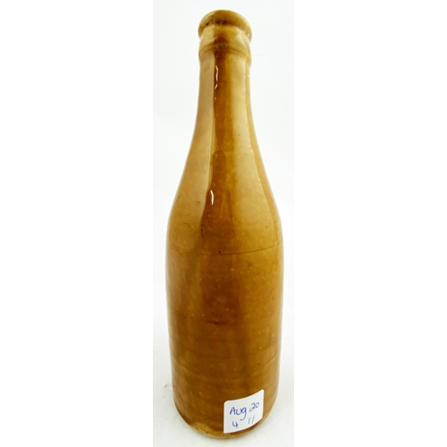 58 - CARLOW GINGER BEER BOTTLE. 8ins tall. Ch, all brown, black transfer CORCORAN & CO/ CARLOW. Trade mar... 