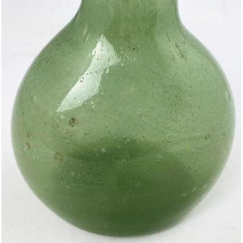 70 - FREEBLOWN PHIAL TYPE BOTTLE. 6.75ins tall. Light greeny/ aqua. Long crude neck, thin rolled lip & eq... 