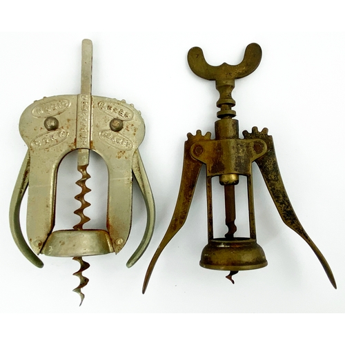 73 - CORKSCREW DUO. Tallest 6.25ins tall. Old plated steel, embossed both sides MAGIC/ LEVER/ CORK/ DRAWE... 