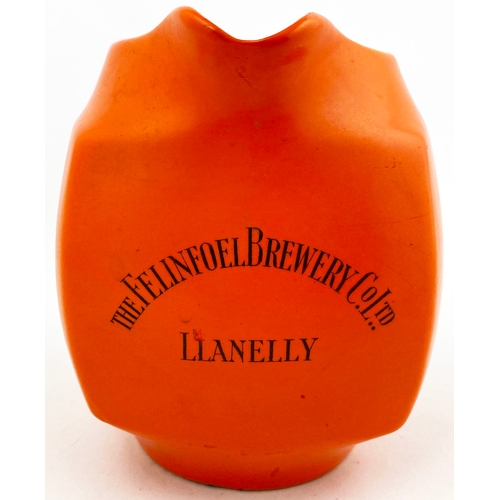 100 - LLANELLY PUB JUG. 5ins tall. Bright orange, black lettering to three side, rear handle THE FELINFOEL... 