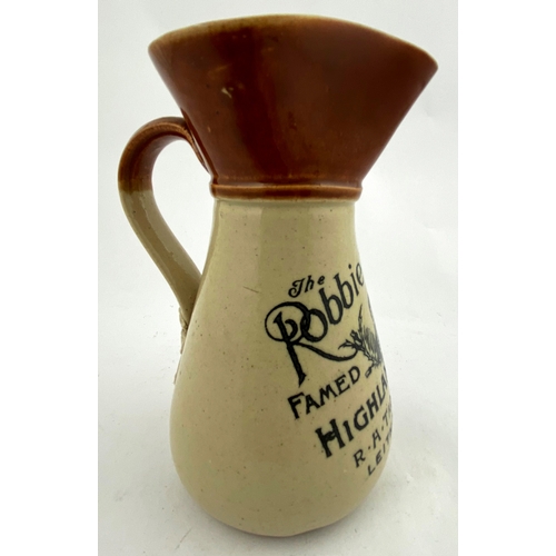 318 - ROBBIE BURNS WHISKY JUG. 6.25ins tall. T.t., rear handle black transfer. THE ROBBIE BURNS/ FAMED OLD... 