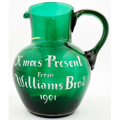 5 - WILLIAMS BROS 1901 GLASS JUG. 5.75ins Jade green glass jug with Xmas Present from Williams Bros 1901... 