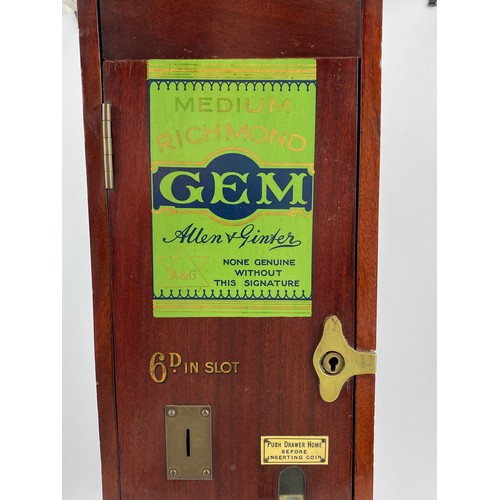 30 - RICHMOND GEM CIGARETTE MACHINE. 22.5ins tall, 7.5ins wide, 8.5ins length. Single dark wooden machine... 